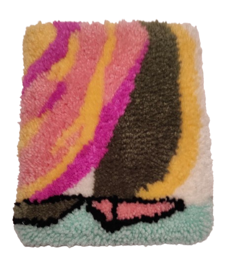 Tapis tufté représentant des voiliers